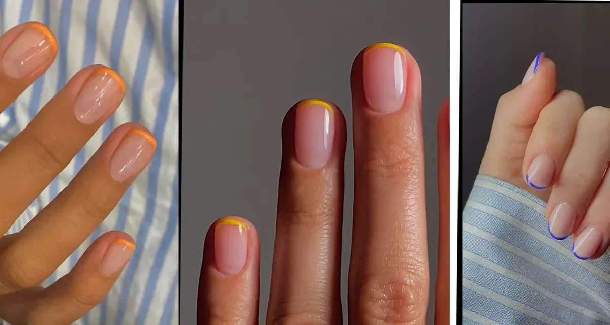 Krótki french z kolorowymi końcówkami: pomarańczowy, żółty i niebieski. Elegancki i nowoczesny manicure.